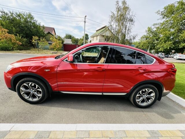 Красный БМВ Х4, объемом двигателя 2 л и пробегом 52 тыс. км за 34000 $, фото 1 на Automoto.ua