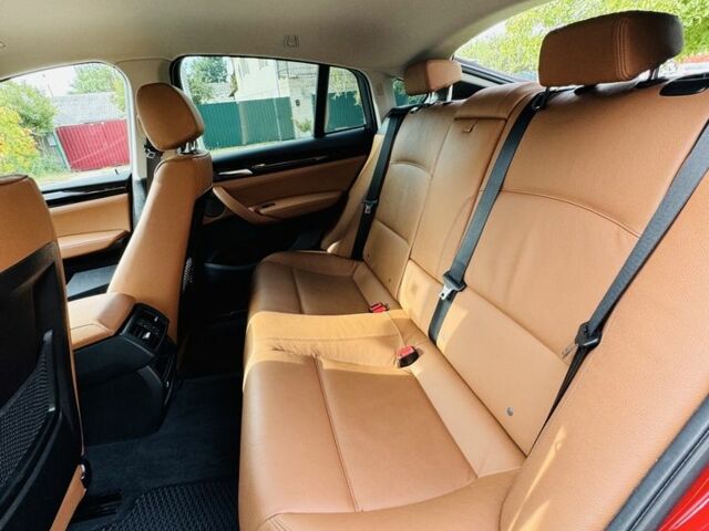 Красный БМВ Х4, объемом двигателя 2 л и пробегом 52 тыс. км за 34000 $, фото 2 на Automoto.ua