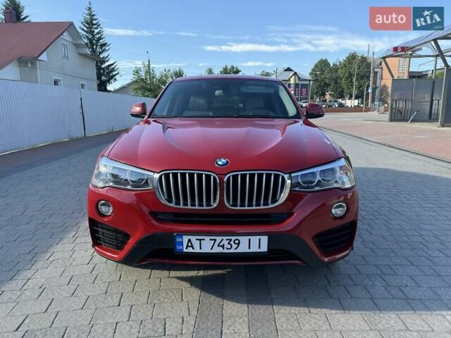 Красный БМВ Х4, объемом двигателя 2 л и пробегом 229 тыс. км за 19600 $, фото 1 на Automoto.ua