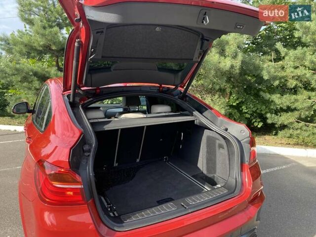 Красный БМВ Х4, объемом двигателя 2.98 л и пробегом 92 тыс. км за 21250 $, фото 9 на Automoto.ua