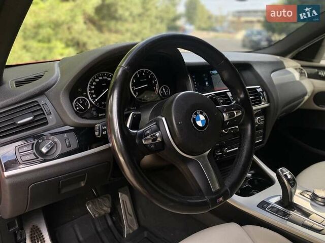 Красный БМВ Х4, объемом двигателя 2.98 л и пробегом 92 тыс. км за 21250 $, фото 12 на Automoto.ua