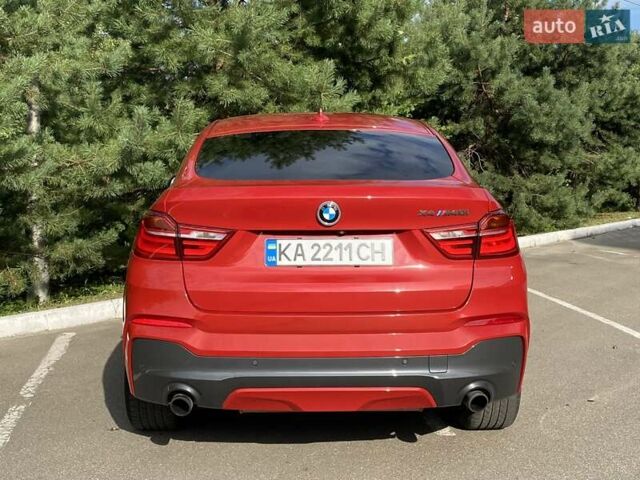 Красный БМВ Х4, объемом двигателя 2.98 л и пробегом 92 тыс. км за 21250 $, фото 7 на Automoto.ua