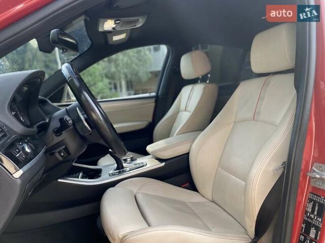 Красный БМВ Х4, объемом двигателя 2.98 л и пробегом 92 тыс. км за 21250 $, фото 10 на Automoto.ua