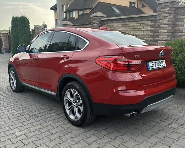 Красный БМВ Х4, объемом двигателя 2 л и пробегом 111 тыс. км за 29000 $, фото 3 на Automoto.ua