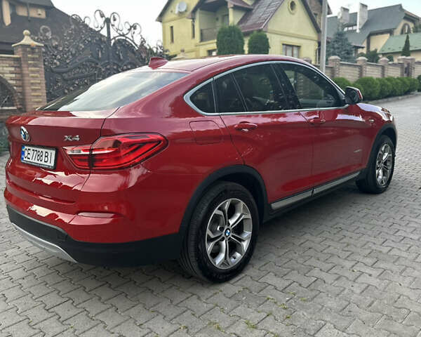 Красный БМВ Х4, объемом двигателя 2 л и пробегом 111 тыс. км за 29000 $, фото 4 на Automoto.ua