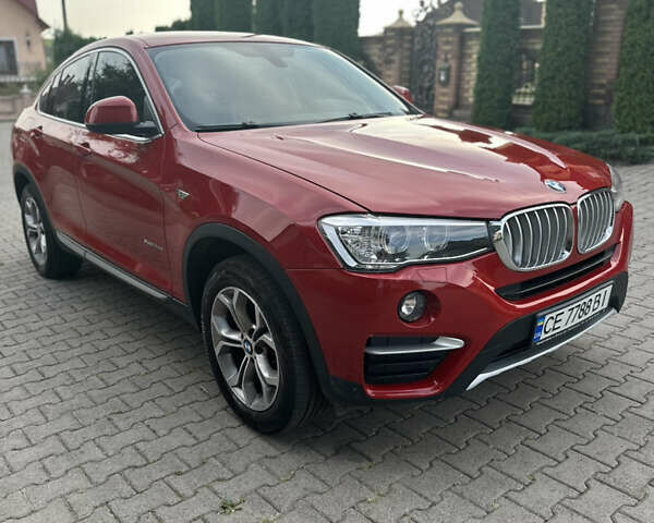 Красный БМВ Х4, объемом двигателя 2 л и пробегом 111 тыс. км за 29000 $, фото 1 на Automoto.ua