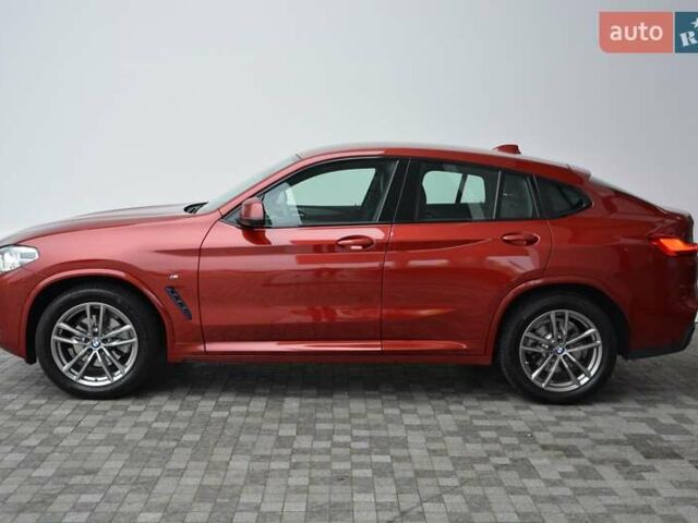 Красный БМВ Х4, объемом двигателя 2 л и пробегом 103 тыс. км за 38500 $, фото 1 на Automoto.ua