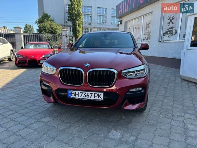 Красный БМВ Х4, объемом двигателя 2 л и пробегом 71 тыс. км за 38500 $, фото 2 на Automoto.ua