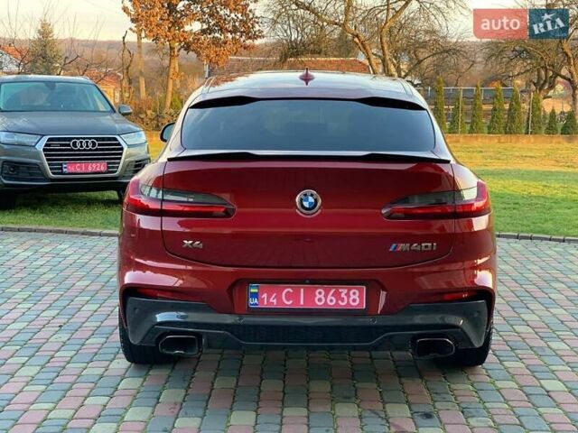 Красный БМВ Х4, объемом двигателя 3 л и пробегом 72 тыс. км за 42700 $, фото 1 на Automoto.ua