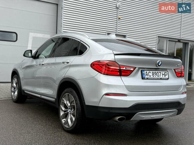 Серый БМВ Х4, объемом двигателя 2 л и пробегом 162 тыс. км за 23500 $, фото 12 на Automoto.ua