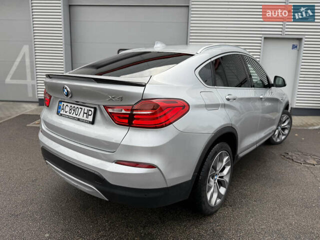 Серый БМВ Х4, объемом двигателя 2 л и пробегом 162 тыс. км за 23500 $, фото 14 на Automoto.ua