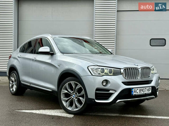 Серый БМВ Х4, объемом двигателя 2 л и пробегом 162 тыс. км за 23500 $, фото 2 на Automoto.ua