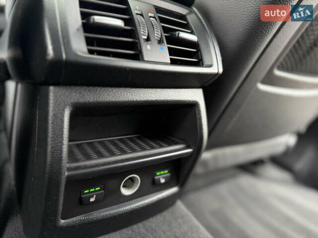 Серый БМВ Х4, объемом двигателя 2 л и пробегом 162 тыс. км за 23500 $, фото 23 на Automoto.ua