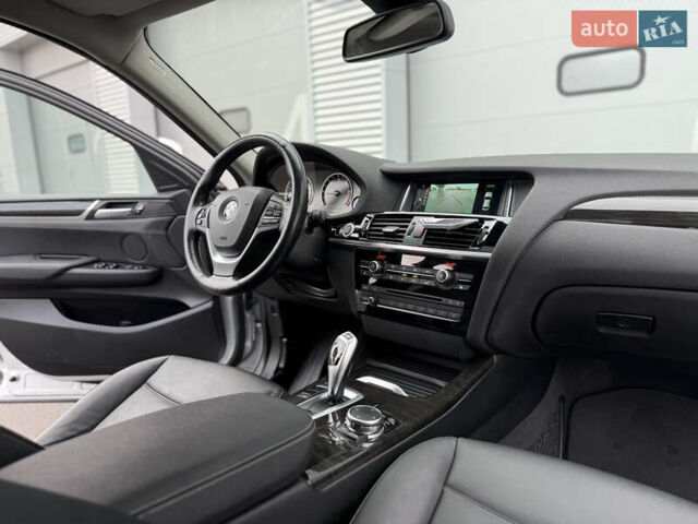 Серый БМВ Х4, объемом двигателя 2 л и пробегом 162 тыс. км за 23500 $, фото 29 на Automoto.ua