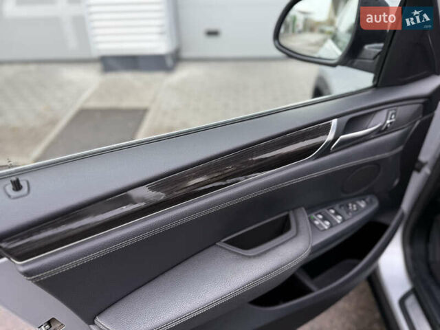 Серый БМВ Х4, объемом двигателя 2 л и пробегом 162 тыс. км за 23500 $, фото 17 на Automoto.ua