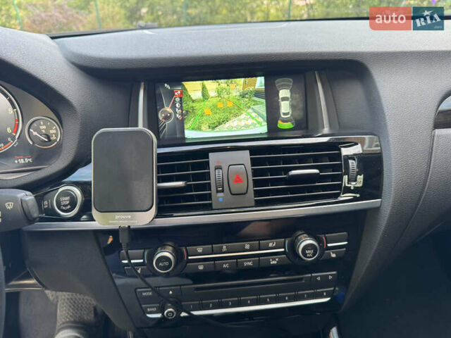Серый БМВ Х4, объемом двигателя 2 л и пробегом 125 тыс. км за 25800 $, фото 13 на Automoto.ua