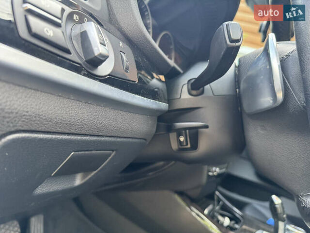 Серый БМВ Х4, объемом двигателя 2 л и пробегом 125 тыс. км за 25800 $, фото 14 на Automoto.ua