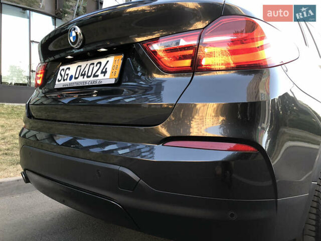 Серый БМВ Х4, объемом двигателя 2 л и пробегом 214 тыс. км за 25500 $, фото 6 на Automoto.ua