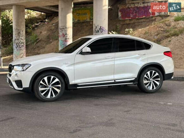 Серый БМВ Х4, объемом двигателя 2 л и пробегом 126 тыс. км за 16500 $, фото 2 на Automoto.ua