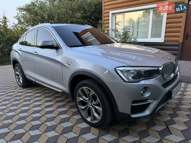 Серый БМВ Х4, объемом двигателя 2 л и пробегом 125 тыс. км за 25800 $, фото 1 на Automoto.ua