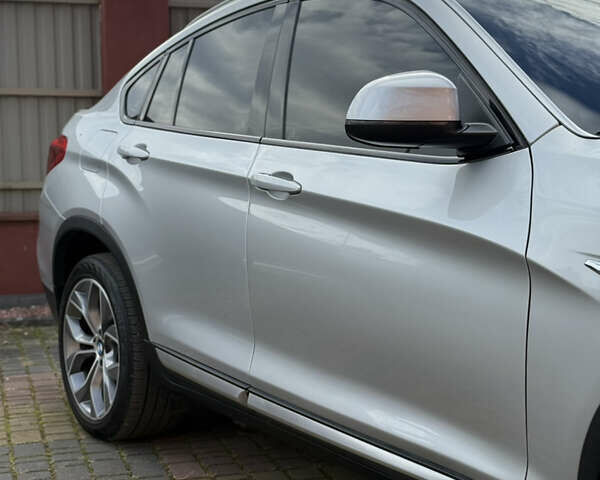 Сірий БМВ Х4, об'ємом двигуна 2 л та пробігом 105 тис. км за 24999 $, фото 24 на Automoto.ua