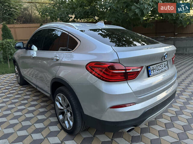Серый БМВ Х4, объемом двигателя 2 л и пробегом 125 тыс. км за 25800 $, фото 3 на Automoto.ua
