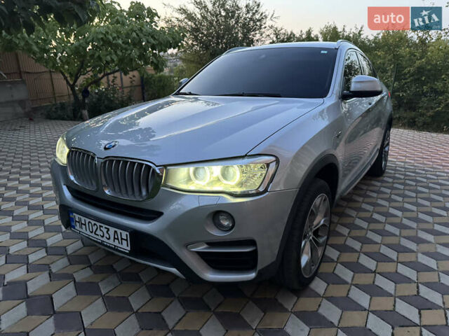 Серый БМВ Х4, объемом двигателя 2 л и пробегом 125 тыс. км за 25800 $, фото 6 на Automoto.ua