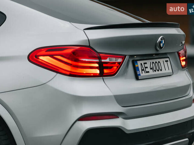 Серый БМВ Х4, объемом двигателя 2 л и пробегом 136 тыс. км за 23000 $, фото 4 на Automoto.ua