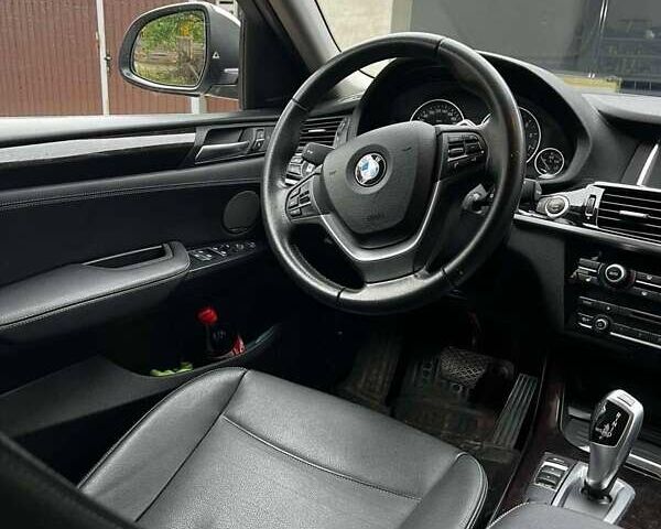 Серый БМВ Х4, объемом двигателя 2 л и пробегом 96 тыс. км за 37500 $, фото 5 на Automoto.ua