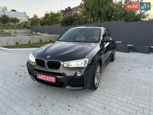 Серый БМВ Х4, объемом двигателя 2 л и пробегом 249 тыс. км за 24500 $, фото 5 на Automoto.ua