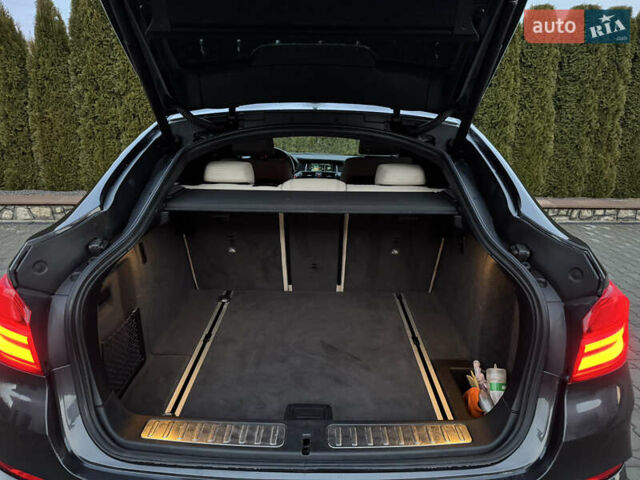 Сірий БМВ Х4, об'ємом двигуна 2 л та пробігом 252 тис. км за 24500 $, фото 16 на Automoto.ua