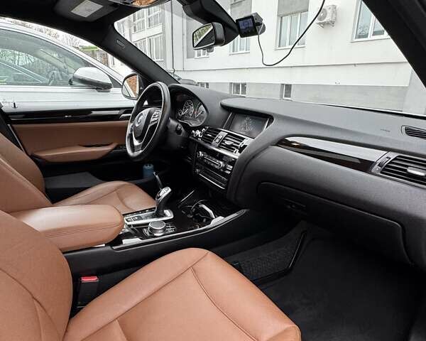 Серый БМВ Х4, объемом двигателя 2 л и пробегом 110 тыс. км за 30000 $, фото 6 на Automoto.ua