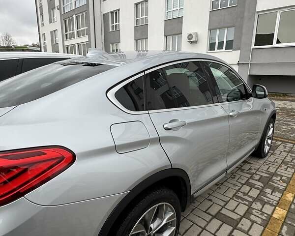 Серый БМВ Х4, объемом двигателя 2 л и пробегом 110 тыс. км за 30000 $, фото 12 на Automoto.ua