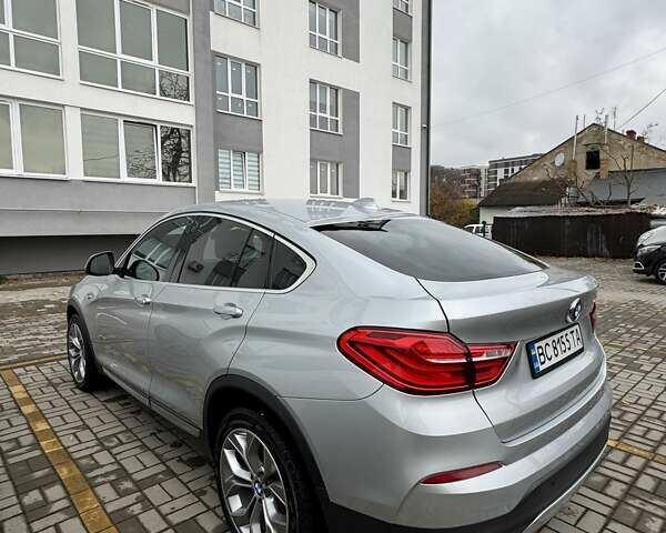 Серый БМВ Х4, объемом двигателя 2 л и пробегом 110 тыс. км за 30000 $, фото 1 на Automoto.ua