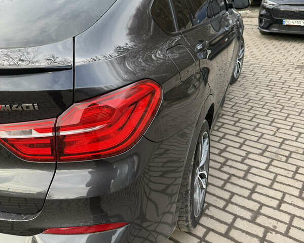 Серый БМВ Х4, объемом двигателя 3 л и пробегом 105 тыс. км за 27499 $, фото 4 на Automoto.ua