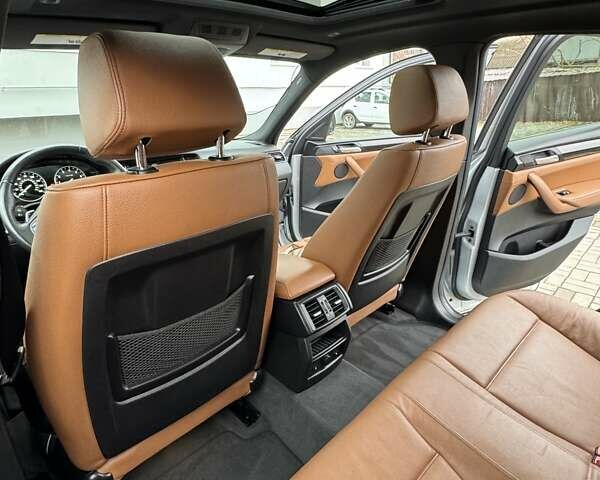 Серый БМВ Х4, объемом двигателя 2 л и пробегом 110 тыс. км за 30000 $, фото 7 на Automoto.ua