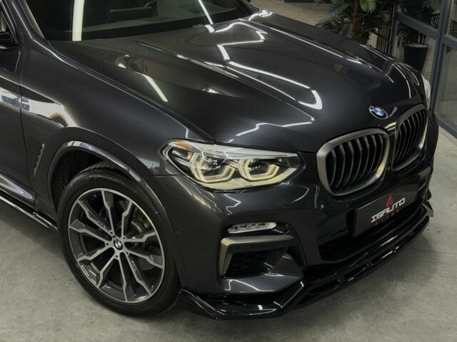 Серый БМВ Х4, объемом двигателя 3 л и пробегом 59 тыс. км за 45900 $, фото 1 на Automoto.ua