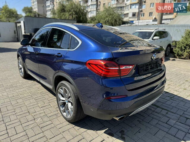 Синий БМВ Х4, объемом двигателя 2 л и пробегом 171 тыс. км за 20800 $, фото 5 на Automoto.ua
