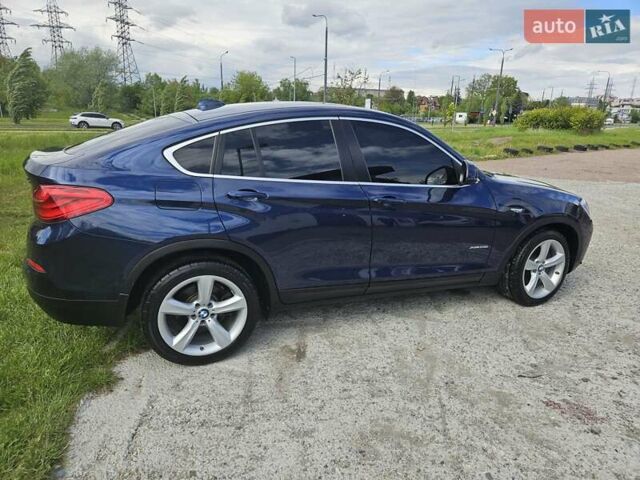 Синий БМВ Х4, объемом двигателя 2 л и пробегом 145 тыс. км за 19700 $, фото 7 на Automoto.ua