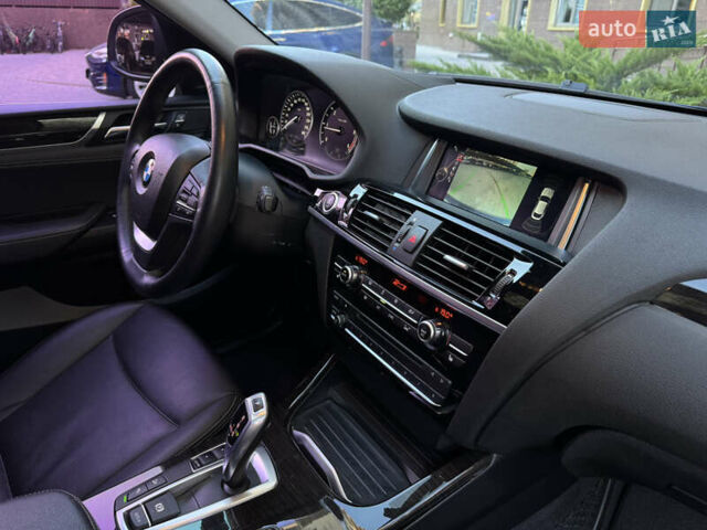 Синий БМВ Х4, объемом двигателя 2 л и пробегом 150 тыс. км за 24900 $, фото 31 на Automoto.ua