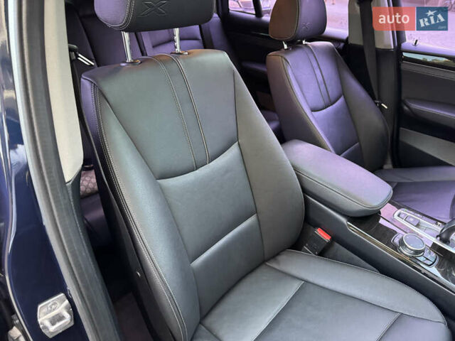 Синий БМВ Х4, объемом двигателя 2 л и пробегом 150 тыс. км за 24900 $, фото 30 на Automoto.ua