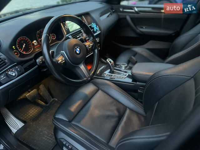 Синій БМВ Х4, об'ємом двигуна 2 л та пробігом 168 тис. км за 23500 $, фото 4 на Automoto.ua