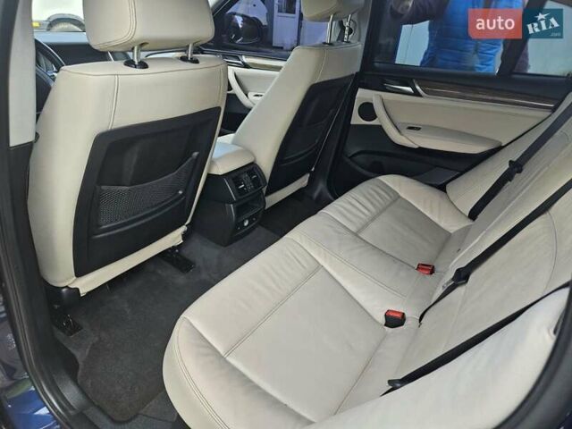 Синий БМВ Х4, объемом двигателя 2 л и пробегом 145 тыс. км за 19700 $, фото 3 на Automoto.ua