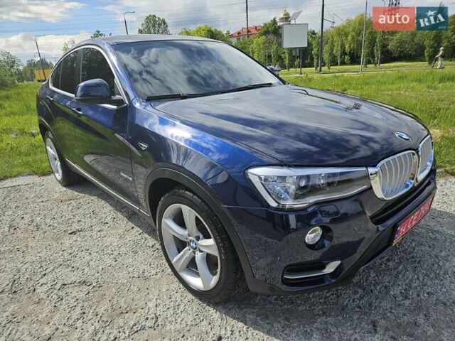 Синий БМВ Х4, объемом двигателя 2 л и пробегом 145 тыс. км за 19700 $, фото 6 на Automoto.ua