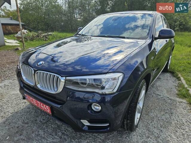 Синий БМВ Х4, объемом двигателя 2 л и пробегом 145 тыс. км за 19700 $, фото 8 на Automoto.ua