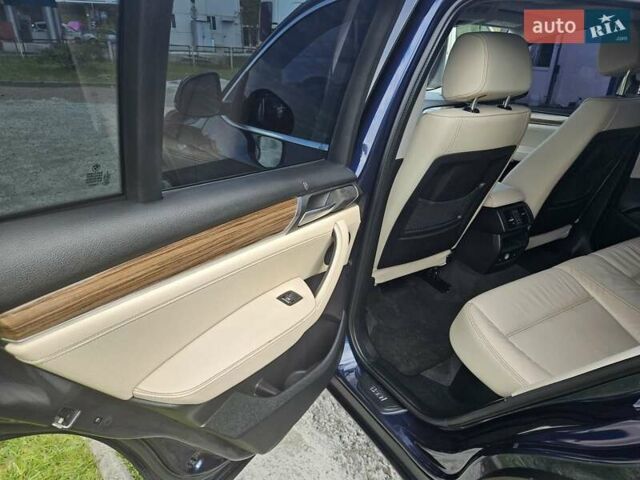 Синий БМВ Х4, объемом двигателя 2 л и пробегом 145 тыс. км за 19700 $, фото 4 на Automoto.ua
