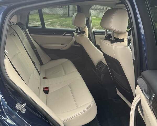 Синій БМВ Х4, об'ємом двигуна 2.98 л та пробігом 138 тис. км за 24500 $, фото 1 на Automoto.ua