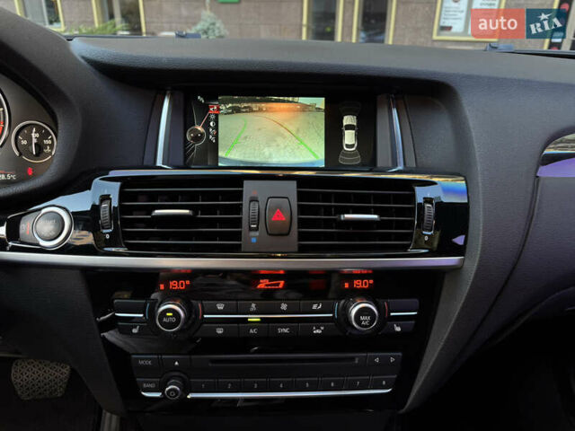 Синий БМВ Х4, объемом двигателя 2 л и пробегом 150 тыс. км за 24900 $, фото 22 на Automoto.ua