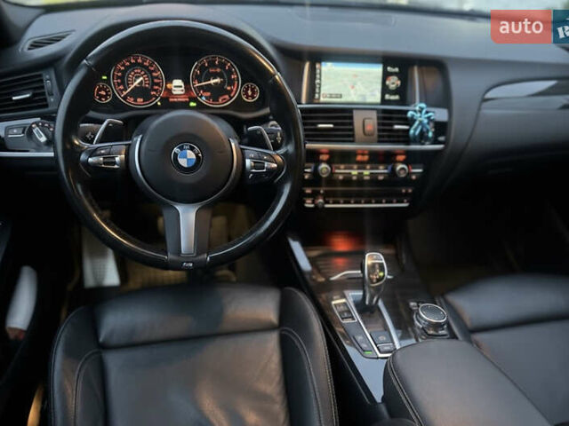 Синій БМВ Х4, об'ємом двигуна 2 л та пробігом 168 тис. км за 23500 $, фото 5 на Automoto.ua