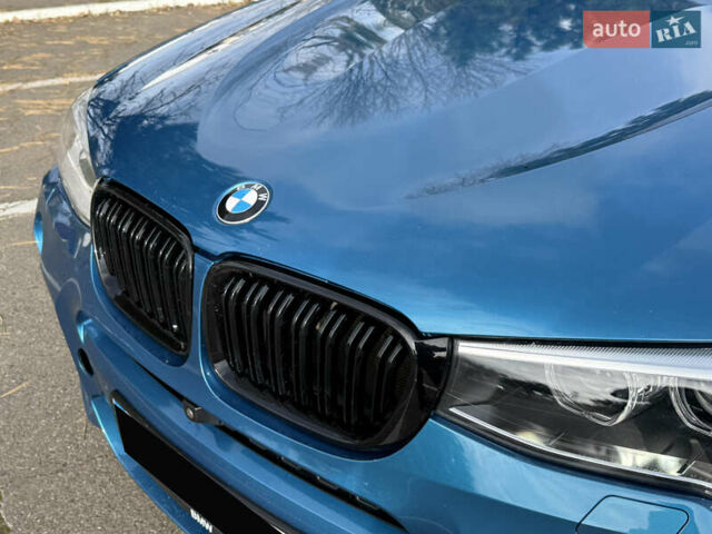 Синій БМВ Х4, об'ємом двигуна 2.98 л та пробігом 130 тис. км за 28300 $, фото 4 на Automoto.ua